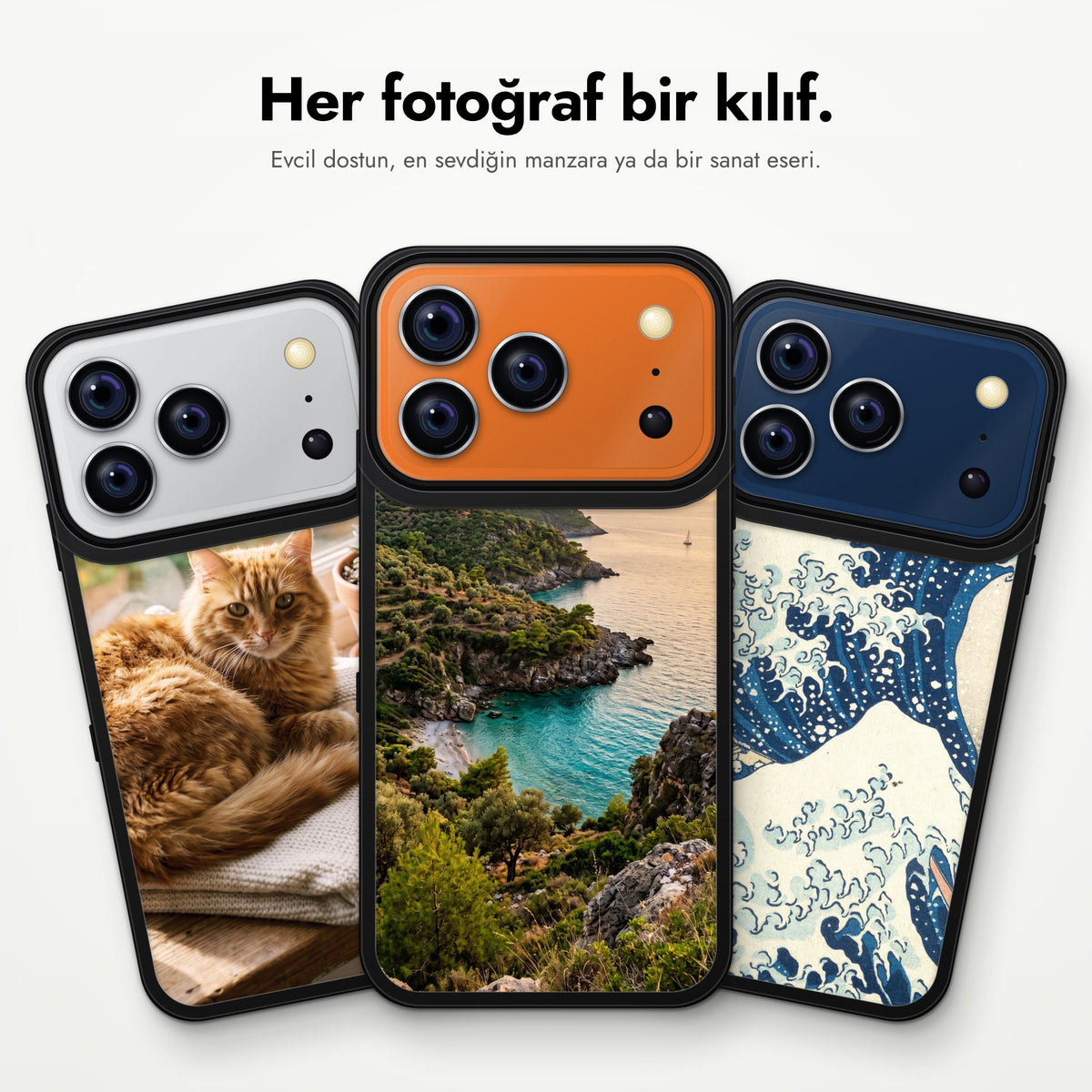 Yan yana üç MagSafe Frame Kılıf: turuncu kedi fotoğrafı, Ege koyu manzarası ve Hokusai'nin Büyük Dalga tablosu basılı kılıflar; başlık: Her fotoğraf bir kılıf.